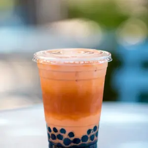 Peach ice tea with popping boba