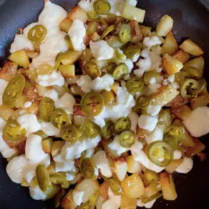 Potatoes with Cheese & Jalapeno Sauce